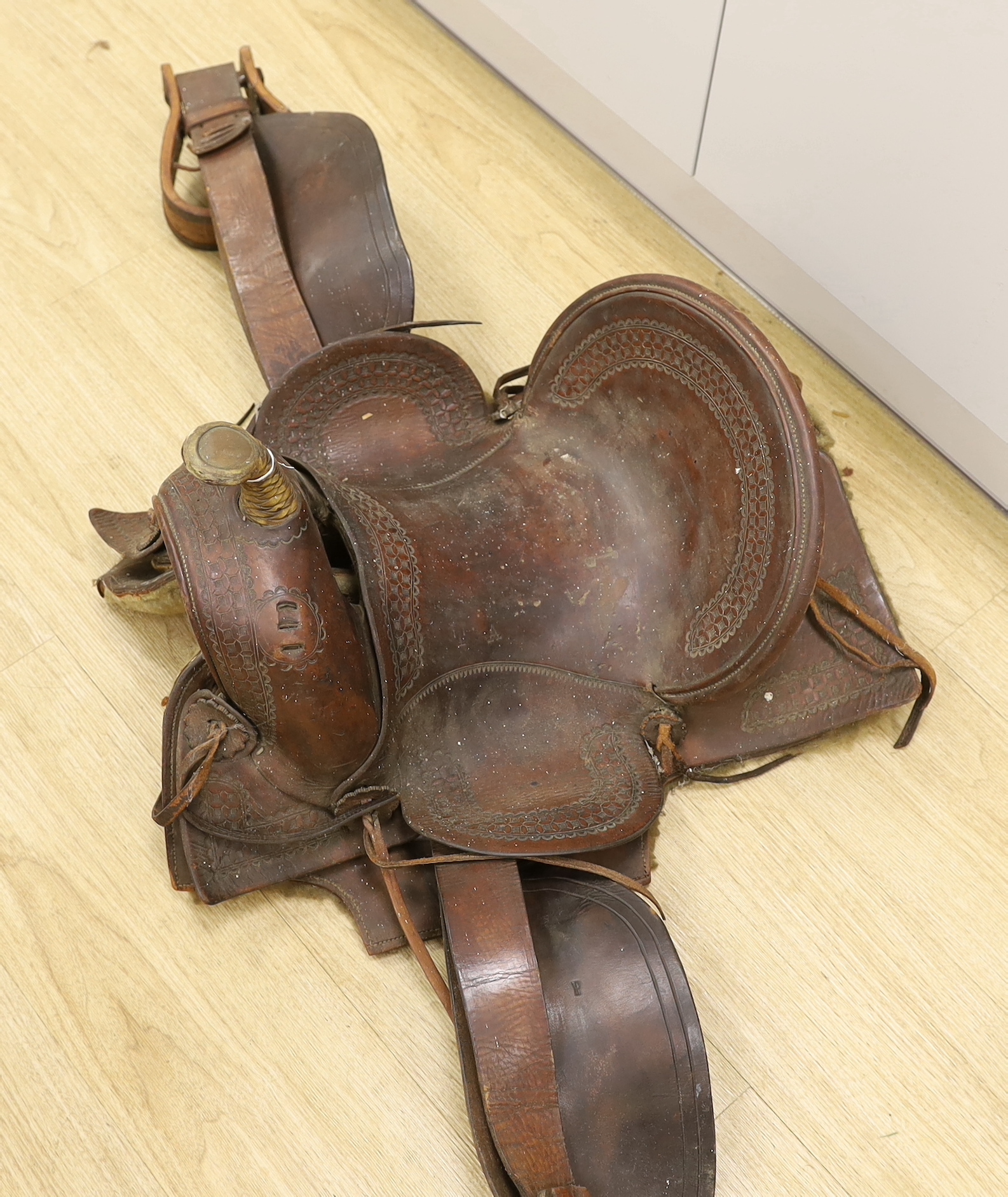 An early 20th century European leather mounted saddle